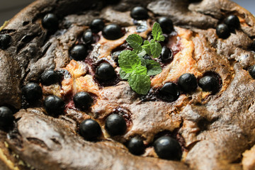 Pie with berries on the windowsill