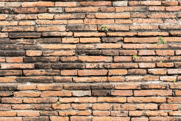 Ancient bricks wall. Old red bricks background.