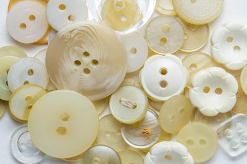 a handful of white buttons for the whole photo