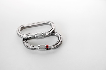 Carabiners for mountaineering, rock climbing and caving on a white background.