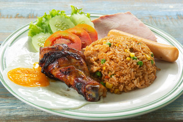 Fried rice Thai Style Served Grilled Chicken, Saucesage ,Ham and Fried Egg