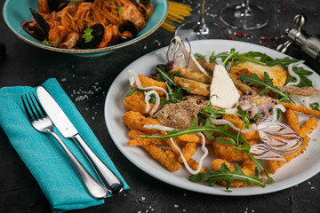 Set of seafood on black backgrounds