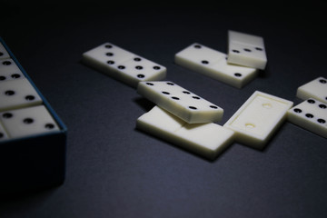 Dominoes on a black background