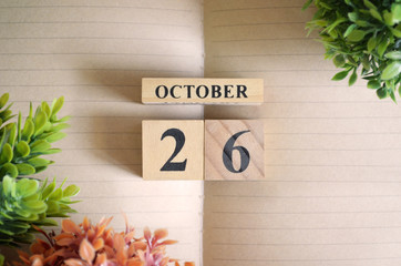 October 26, Appointment date with number cube design for background.
