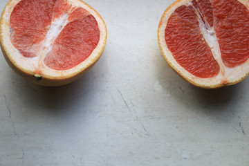 Grapefruit halves on the table