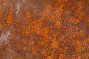Metallic rusty texture with scuffed spots. Old metal sheet covered with corrosion, scuffs of brown,...