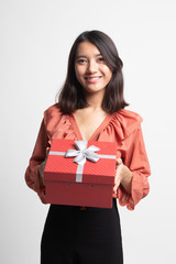 Fototapeta premium Young Asian woman with a gift box .