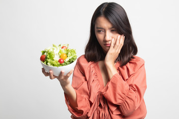 Asian woman hate salad .