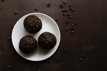 Chocolate cupcakes on a white plate