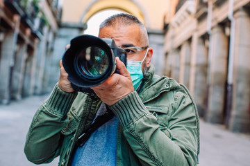 Professional photographer working in pandemic period