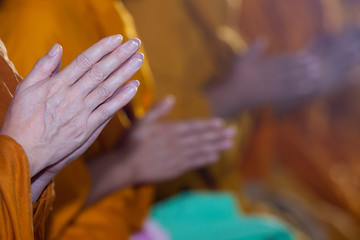 Obraz na płótnie Canvas hands of Thai monks