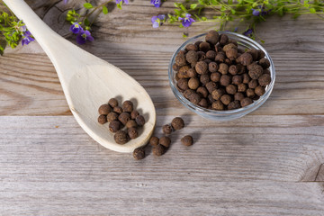 Close up on spoon with allspice (pimento)