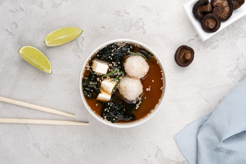 Miso soup with rice, tofu cheese and wakame seaweed. A traditional Japanese dish. Food delivery.