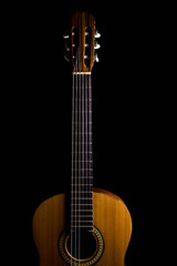 Obraz premium classic spanish guitar on black background