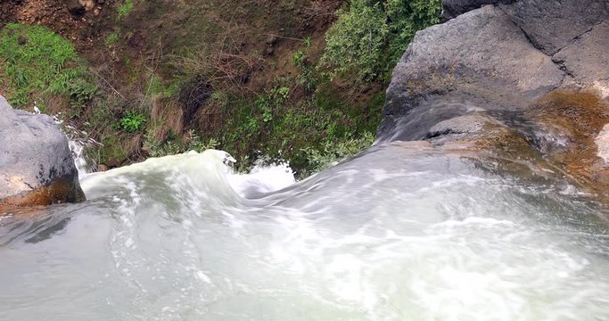 River water just before they flowed to the waterfall. The opposite viewpoint to the beginning of the waterfall.