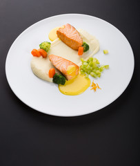 Fried salmon fillet with vegetables