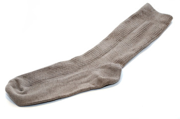 one sock of gray-brown color on a white background