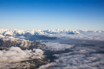 Aerial View of Remote Canadian Mountain Landscape during sunny morning. Located near Vancouver, British Columbia, Canada. Nature Background. Authentic