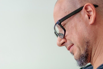 Fototapeta premium profile of man with beard and glasses, narrow focus