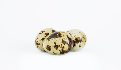 Quail eggs isolated on a white background. Protein delicacy.