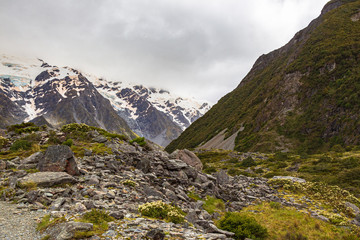 Fototapeta na wymiar Snowy mountains in the Southern Alps. Scree in the mountain. South Island, New Zealand