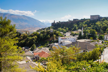 Fototapeta premium The ancient medieval city of Gjirokastër in southern Albania is a UNESCO World Heritage Site and a popular tourist destination in Albania. Ancient Ottoman city
