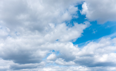 Fototapeta premium Huge white and grey clouds in the sky.