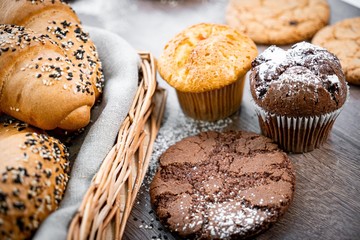 Fresh bakery, sliced bread on a wooden backround