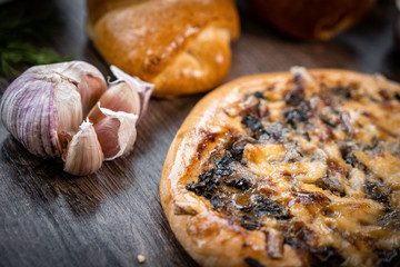 Fresh bakery, sliced bread on a wooden backround