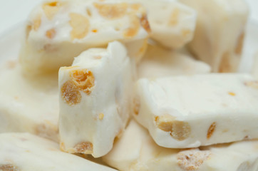 Traditional confections made with sugar or honey, roasted nuts and whipped egg whites