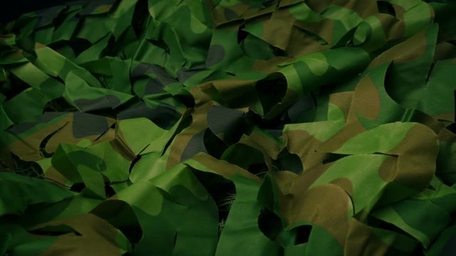 Military Camo Covering Fabric Moving Shot