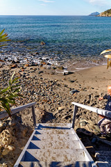 Fototapeta na wymiar Landscape of Bathing beach Porto Frailis on the rocky coast of Sardinia - Italy