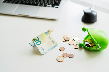 Euro money and rubles and wallet on the table