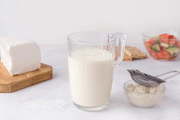 Fermented milk drink kefir in a glass. Healthy breakfast concept