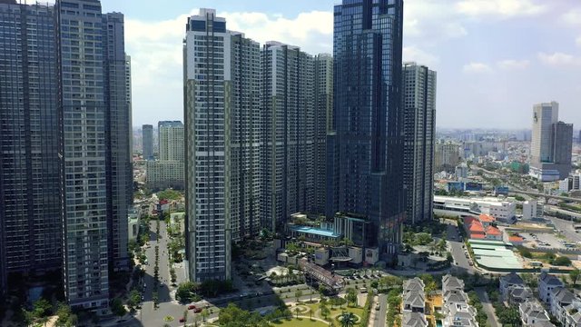 HOCHIMINH, VIETNAM - APRIL, 2020: Aerial panorama view of skyscrapers in one of the districts of Hochiminh.