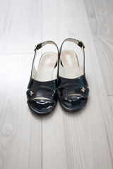 Women's shoes on a wooden floor