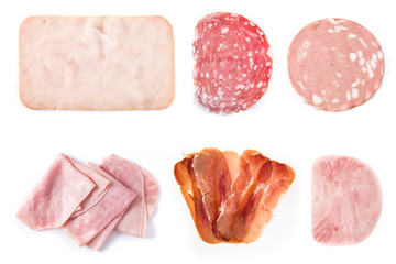 Assortment of different cold meat collage isolated on white background