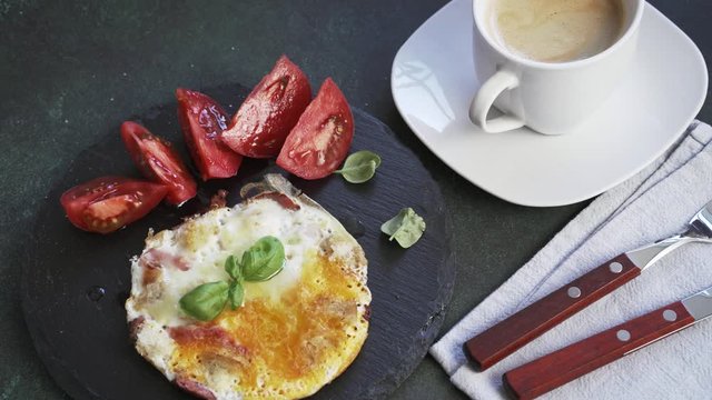 Frittata with tomatoes and coffee top view