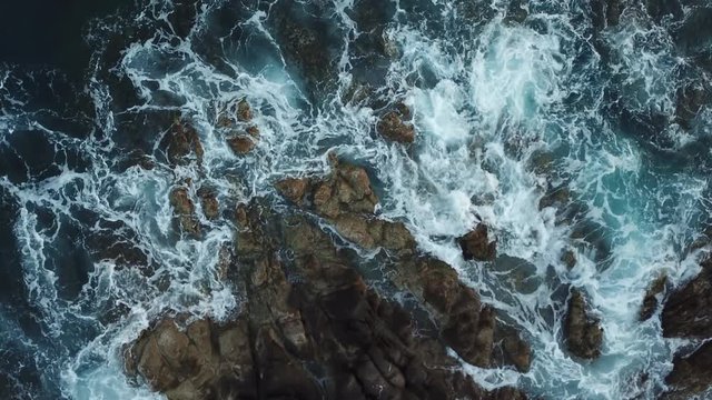 aerial view of the movement of the sea on a beach in the tourist area of Los Cabos in Baja California Sur in Mexico