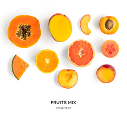 Creative layout made of orange fruits. Flat lay. Food concept. Papaya, apricot, mango, melon, peach, orange, guava, grapefruit on white background.