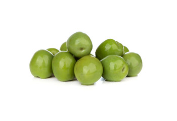 Pickled olives on a white background. Bunch of pickled green olives isolated on white background.
