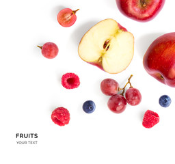 Creative layout made of apple, raspberry, grape and blueberry. Flat lay. Food concept. 