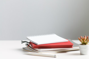 Business composition. A stack of notebooks. Close-up.