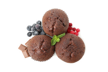 Delicious chocolate muffins isolated on white background