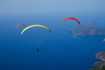 Top view, Blue Lagoon, Oludeniz coast, Fethiye, Mugla. Popular tourist place to travel in Turkey, nature reserve, active sport paragliding, parachute jump, view of the mountains and the sea from above