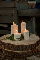 Obraz na płótnie Canvas four candle log wood plate fire flame outdoor 