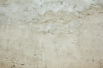 Grey concrete wall with cement and plaster on rough surface texture background.