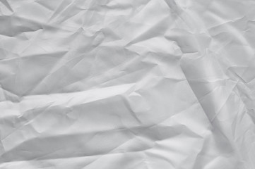 Crumpled white texture, crumpled white fabric, abstract background