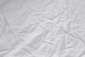 Crumpled white texture, crumpled white fabric, abstract background