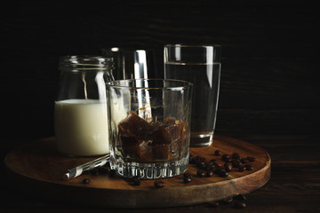 Composition of prepare ice coffee on wooden background